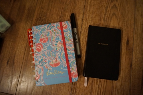 Lilly Pulitzer 2015 planner, Sharpie pen & my small black notebook for jotting down ideas & so I don't forget things while I'm out!