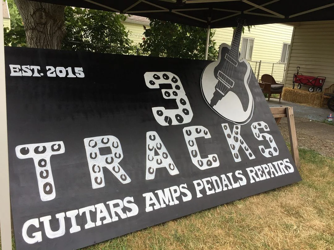 3 Tracks Outdoor Sign