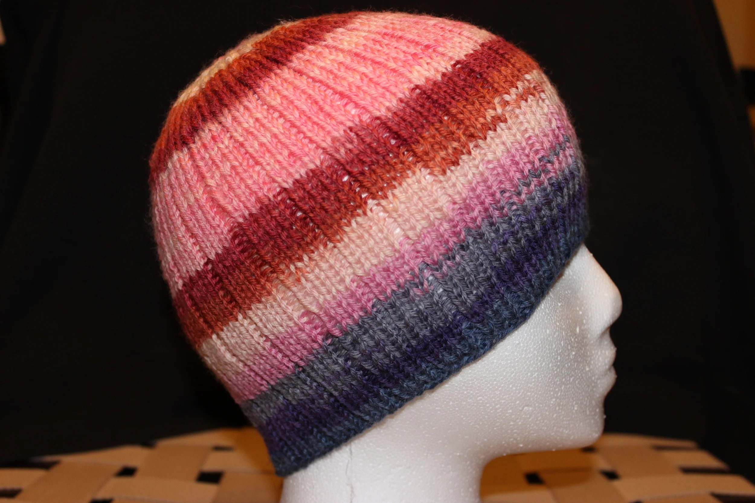Jelly Benie, Pink, purple, and blue hat.