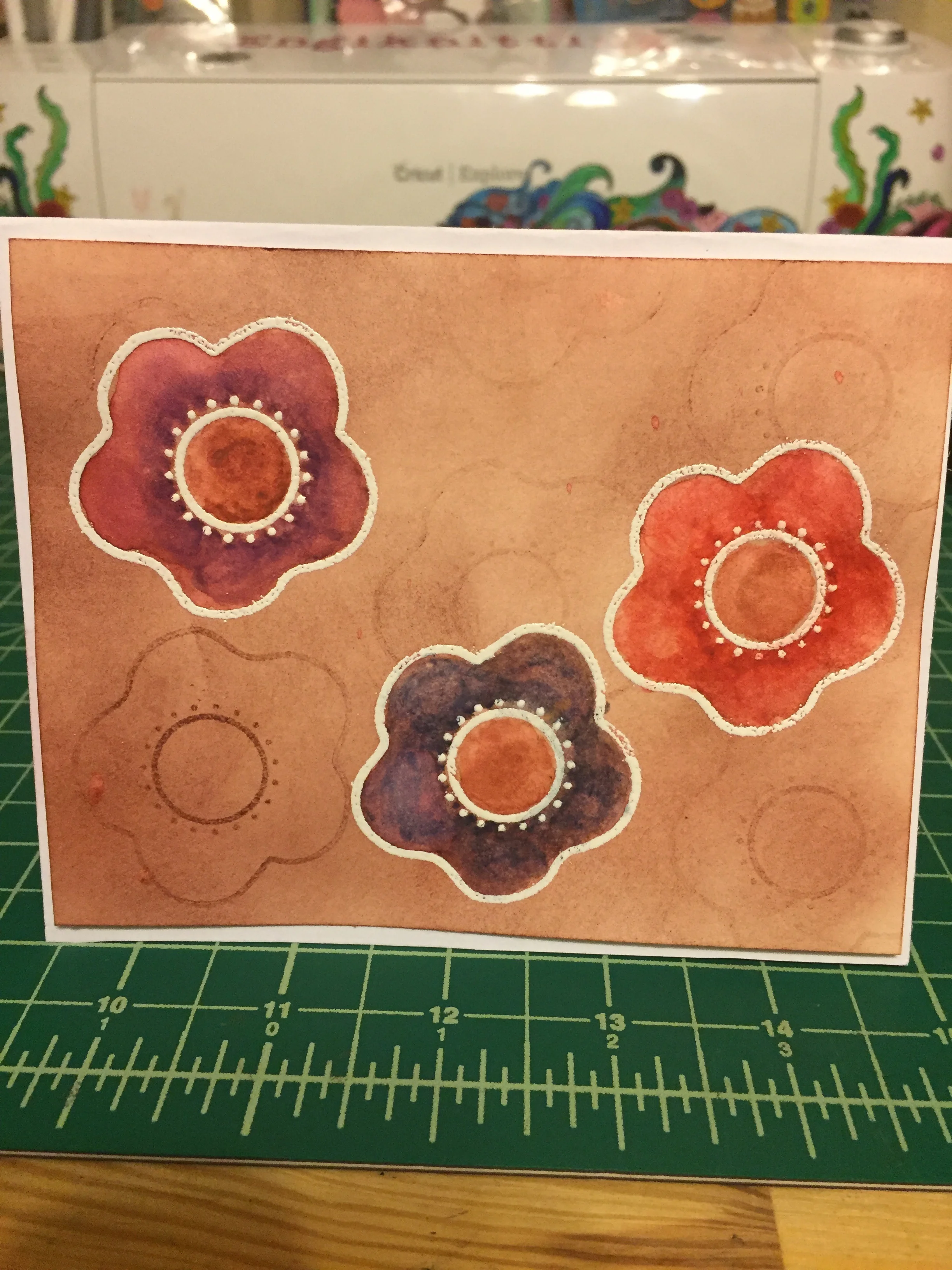 Done with embossing powder, watercolor pencils, and distress ink.