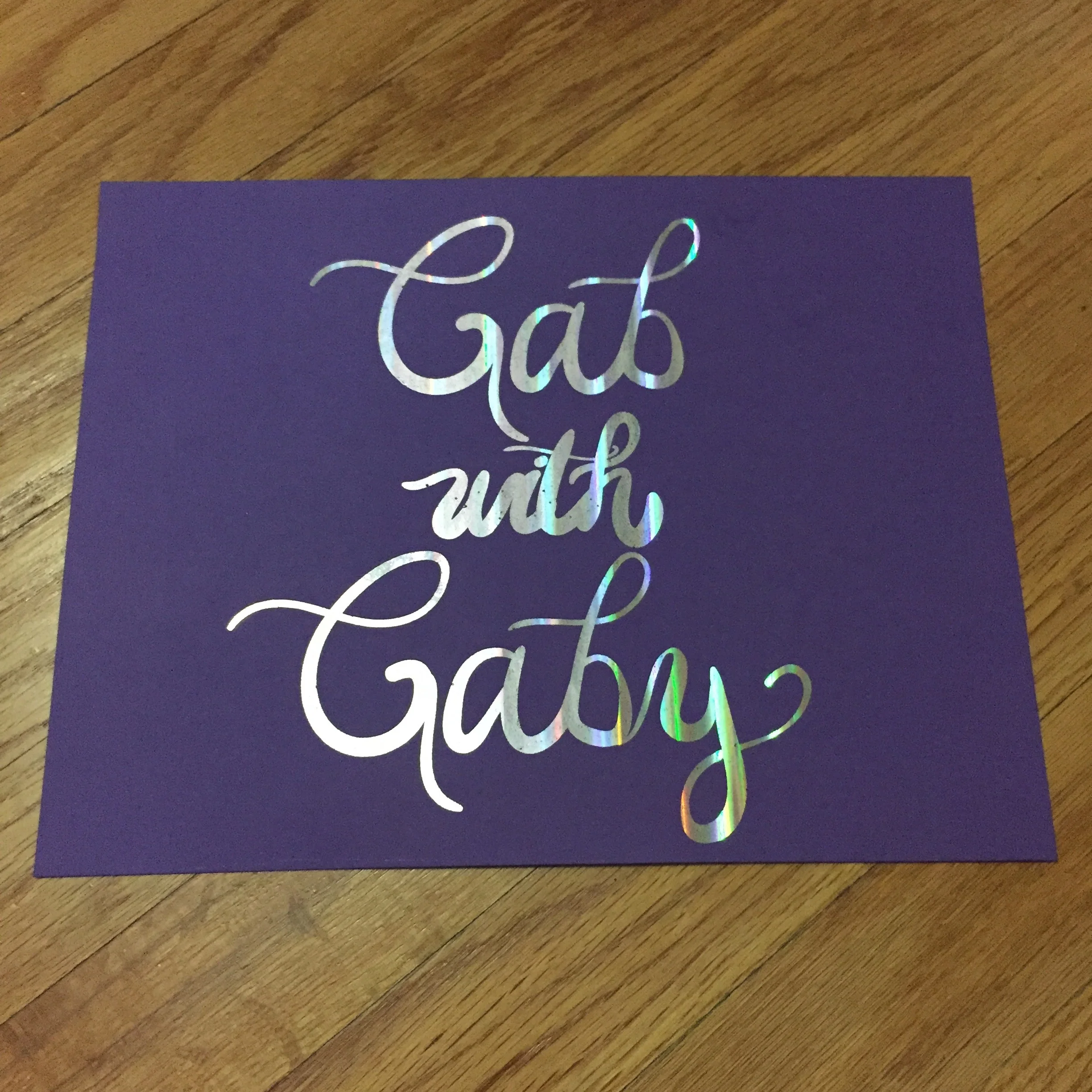 Holographic on purple.