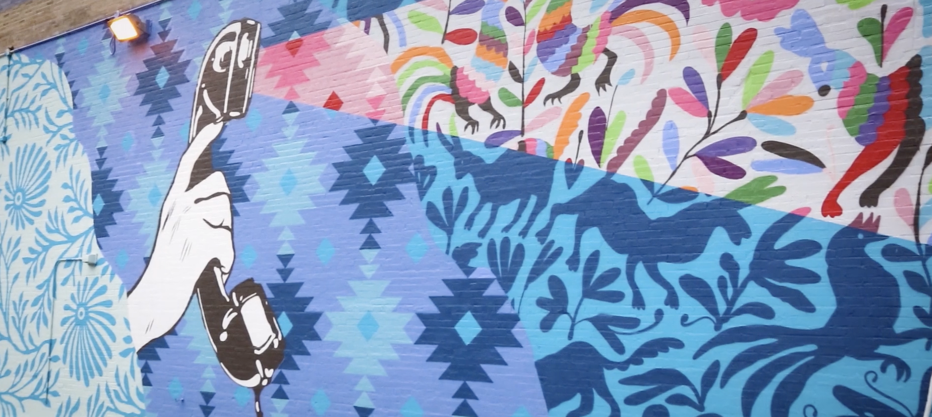 Sister Cities Toronto-Chicago Mural Exchange, pictured detail of Kirsten McCrea / HelloKirsten’s “Listen to Learn,” Chicago 2019
