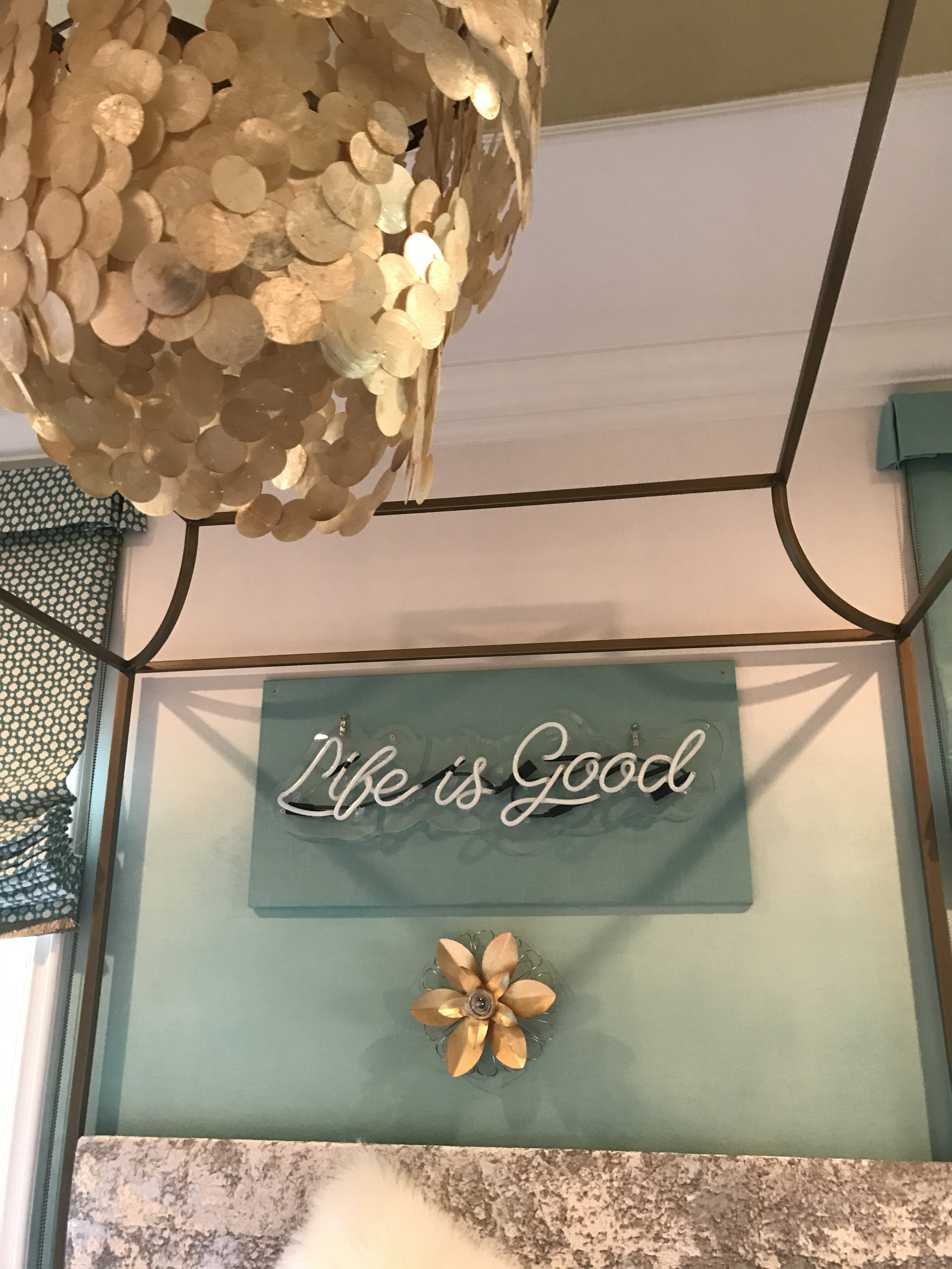  “Life is Good” is the motto of a tween girl, the daughter of a client of ours. We brought this quote to life in a custom neon sign above her bed.  