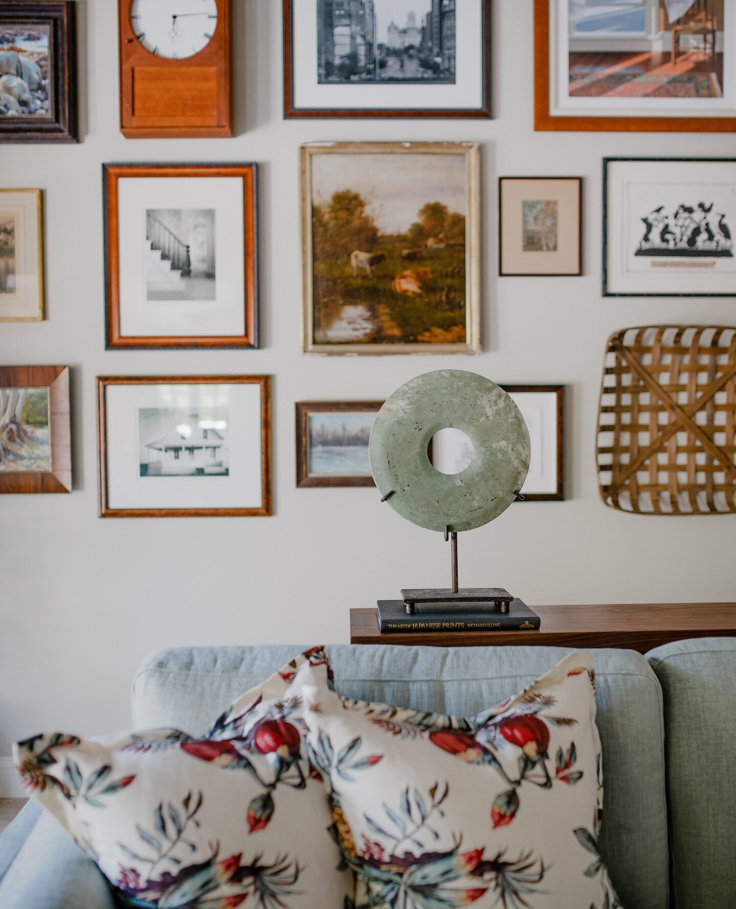 This gallery wall is the perfect example of how we work with clients existing collections of all kinds and integrate them into the design. The client here was sure we would want to trash some of these treasures, but no! Just look how artfully the col