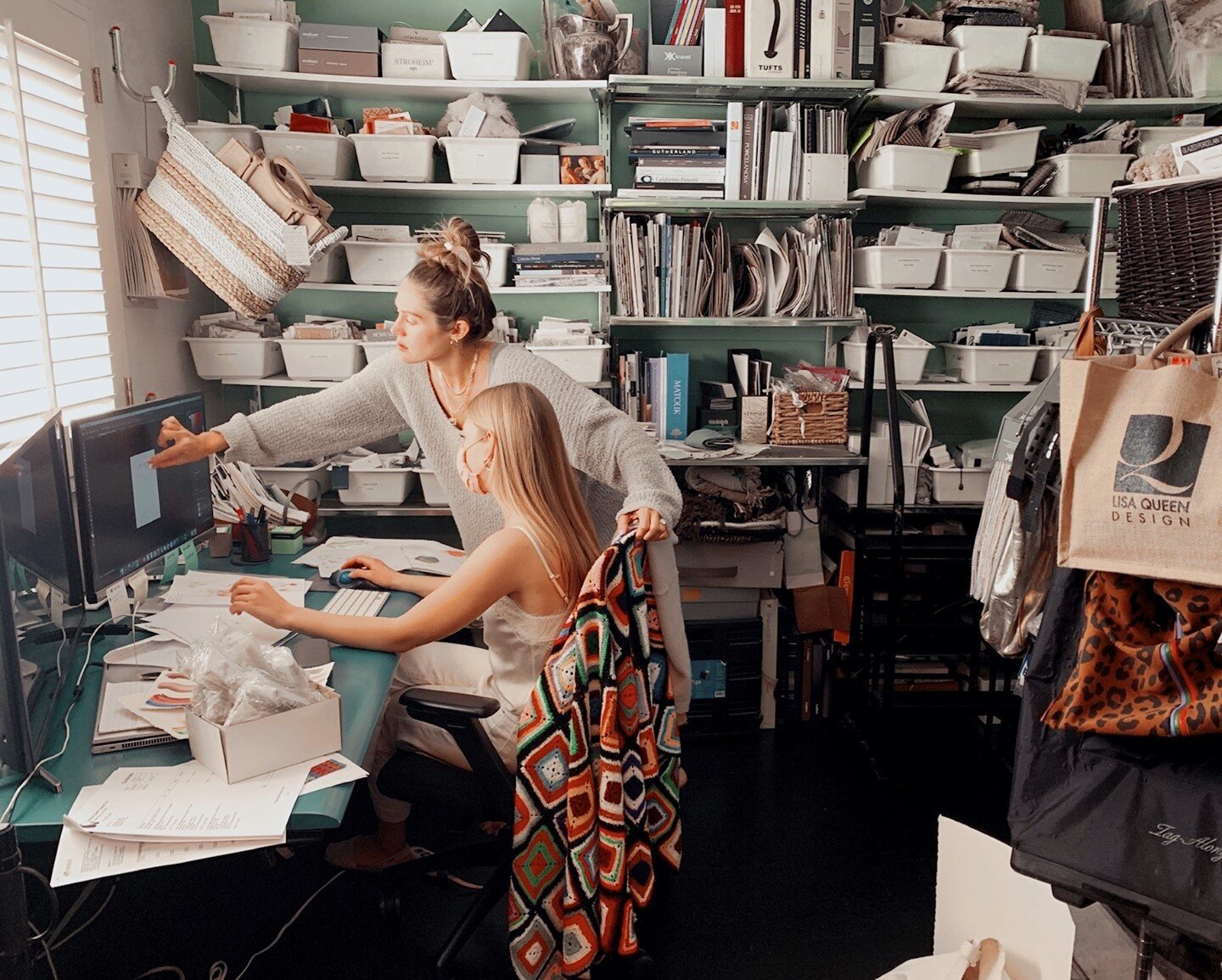 BTS working on our candle collab with @Apothenne at LQD HQ. Also, a real peek into a designer's working library!