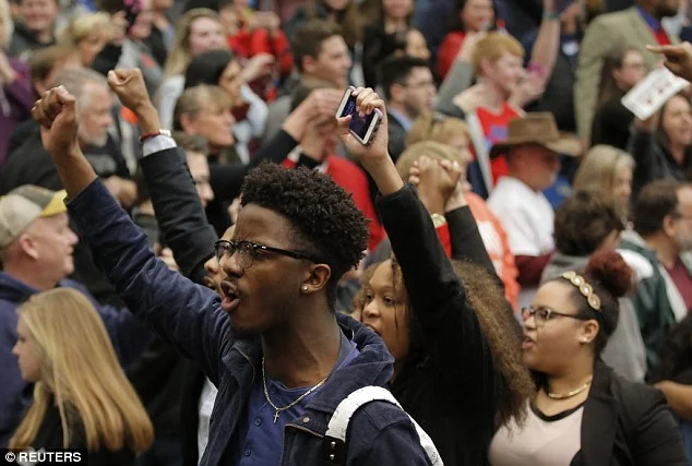 Black Lives Matter protesters at a February 29, 2016 Trump rally, shortly before being escorted out of the venue.