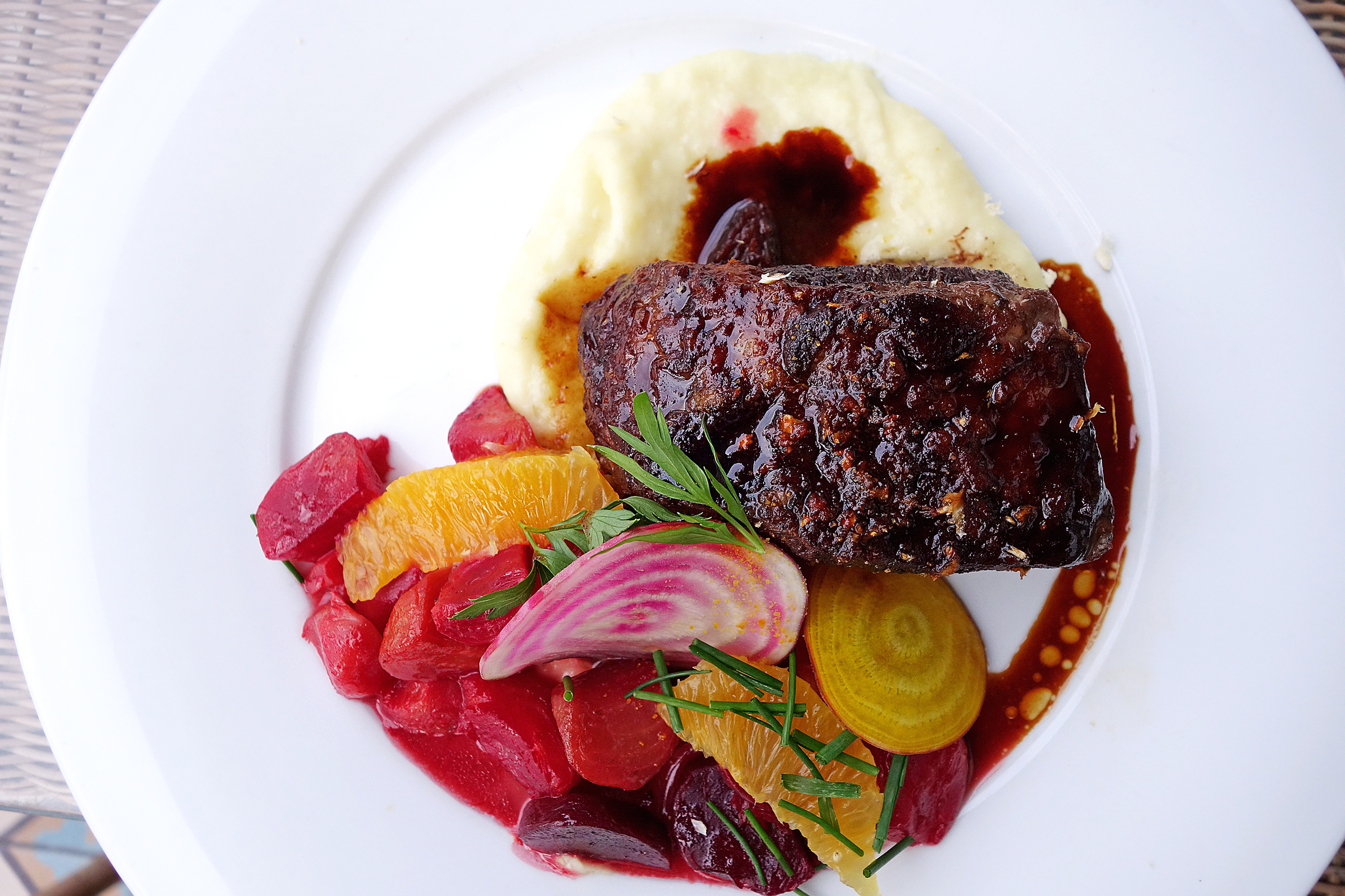 BOEUF BORDELAISE $29 (" braised short rib, roast garlic potato puree, beets, cippolini and pearl onions")