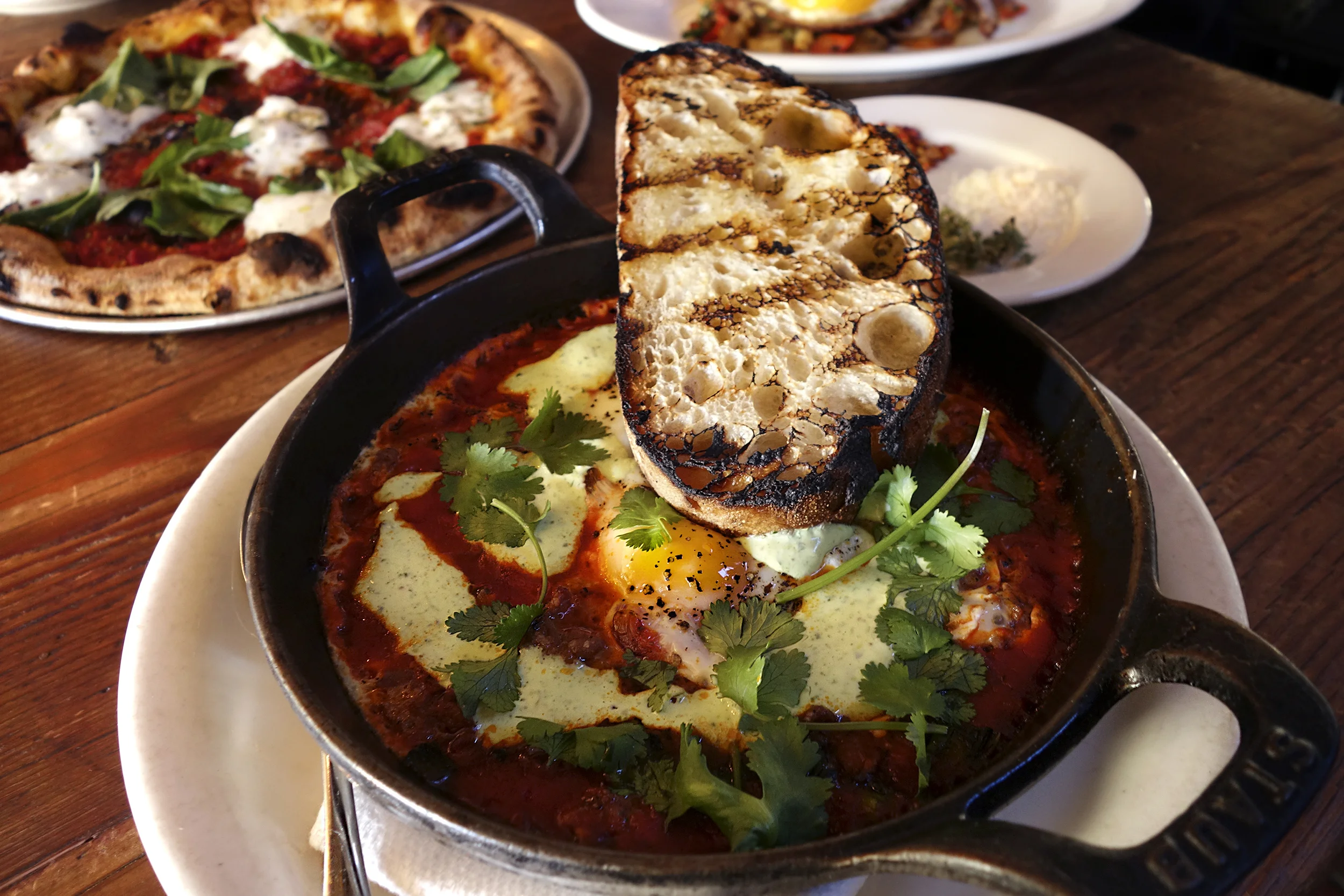 Merguez, Chili, Tomato Sauce, cilantro & Spiced yogurt