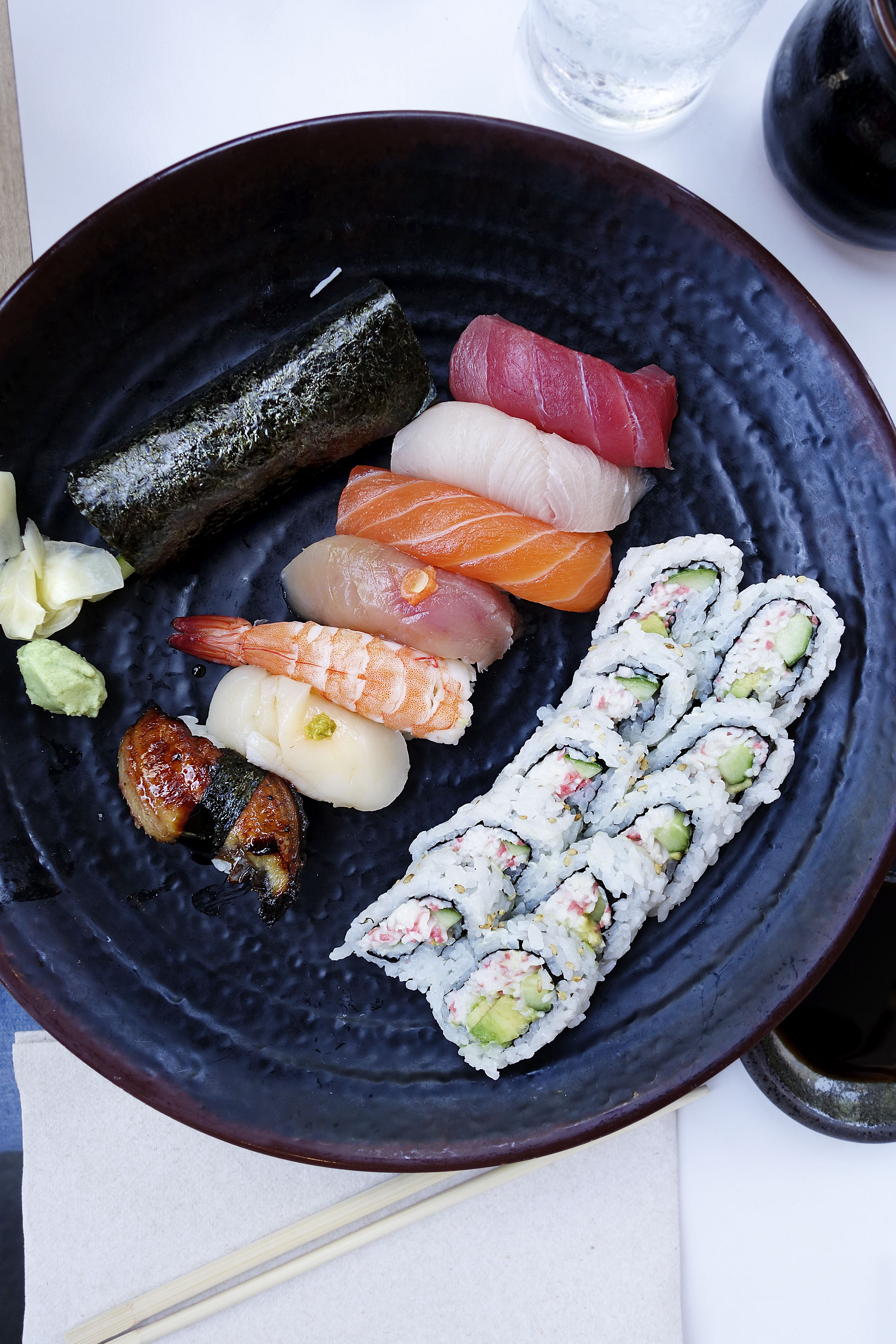 Sushi top to bottom: tuna, yellowtail, salmon, albacore, shrimp, scallop, and unagi