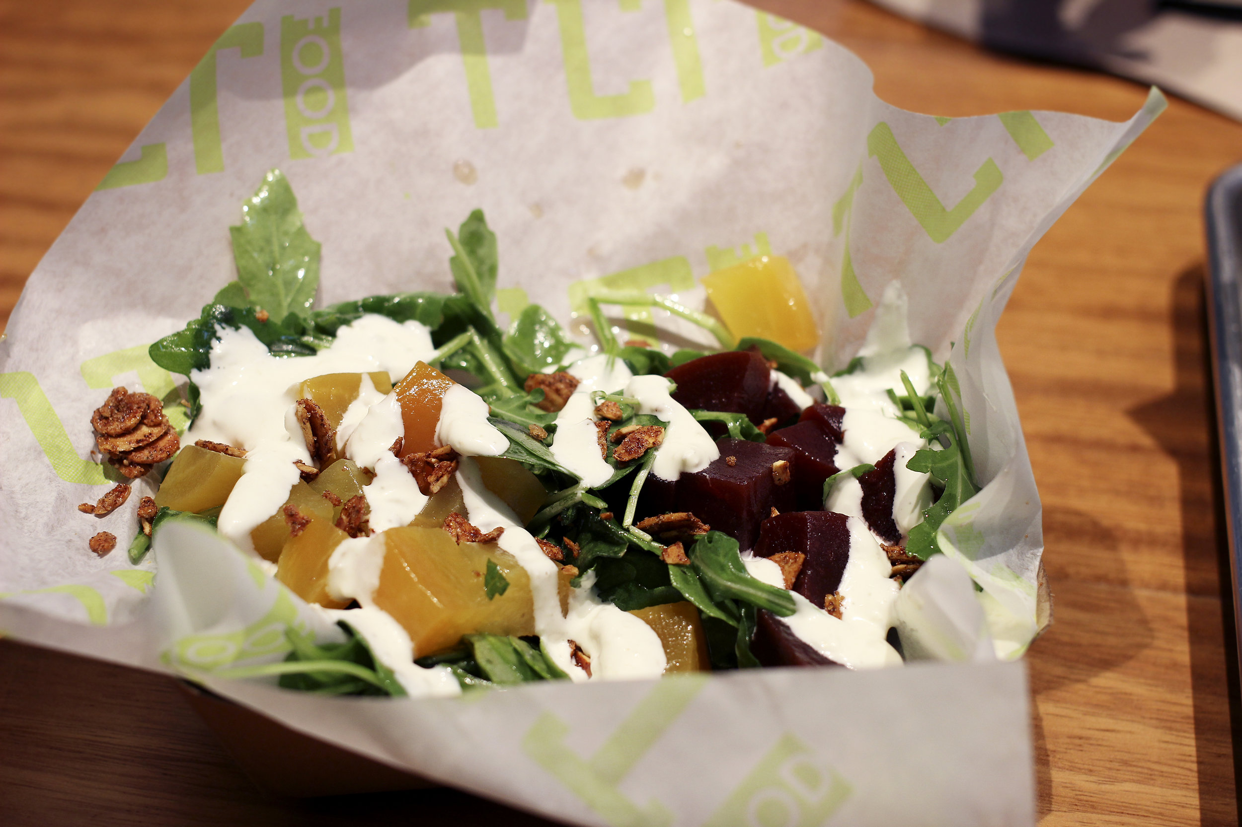 Beet Salad - Pickled Golden Beets, Roasted Red Beets, Arugula, Mint, Spiced Candied Almonds & Whipped Goat Cheese