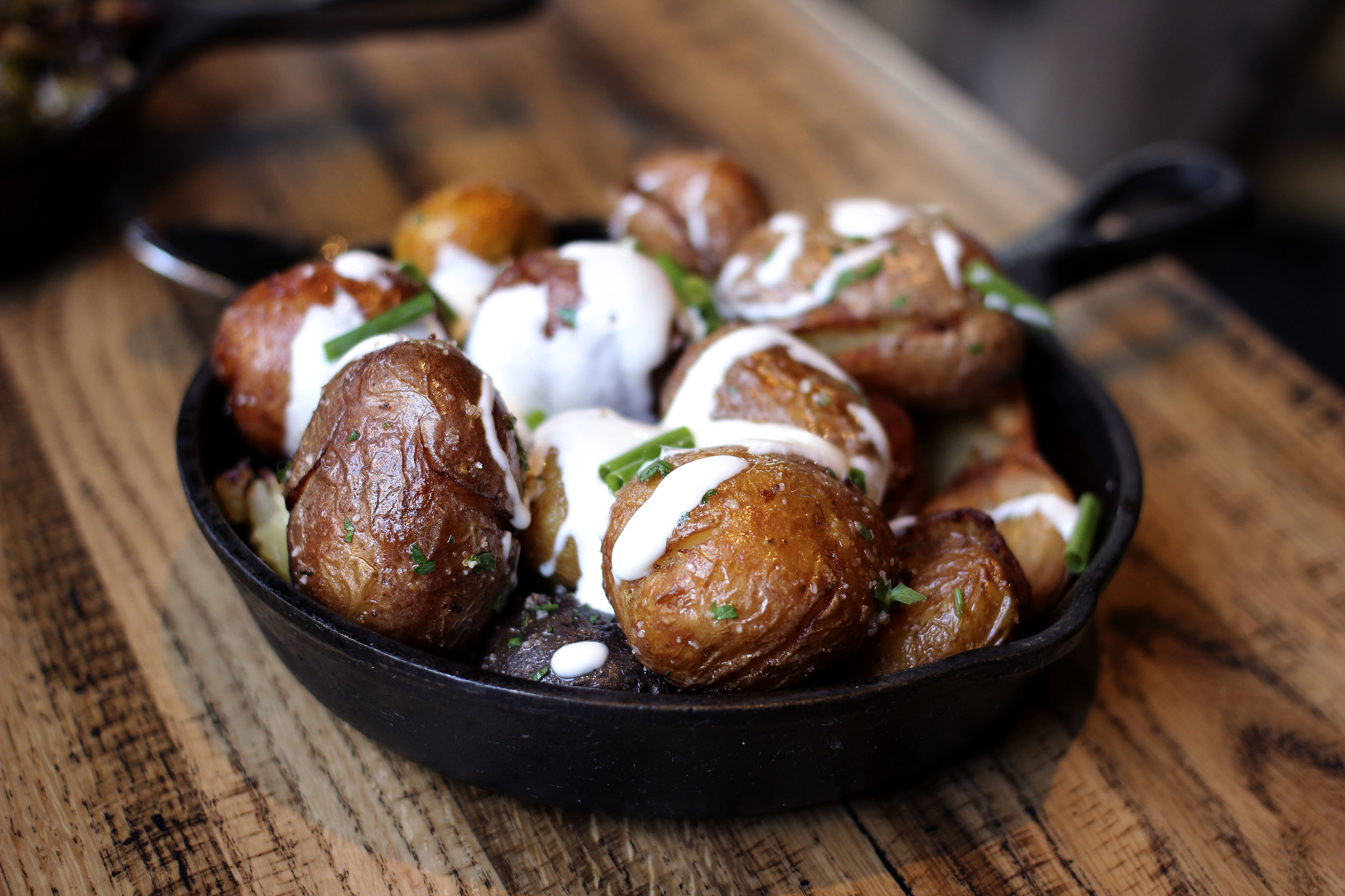 Charred Marble Potatoes - white truffle, crème fraîche, chive
