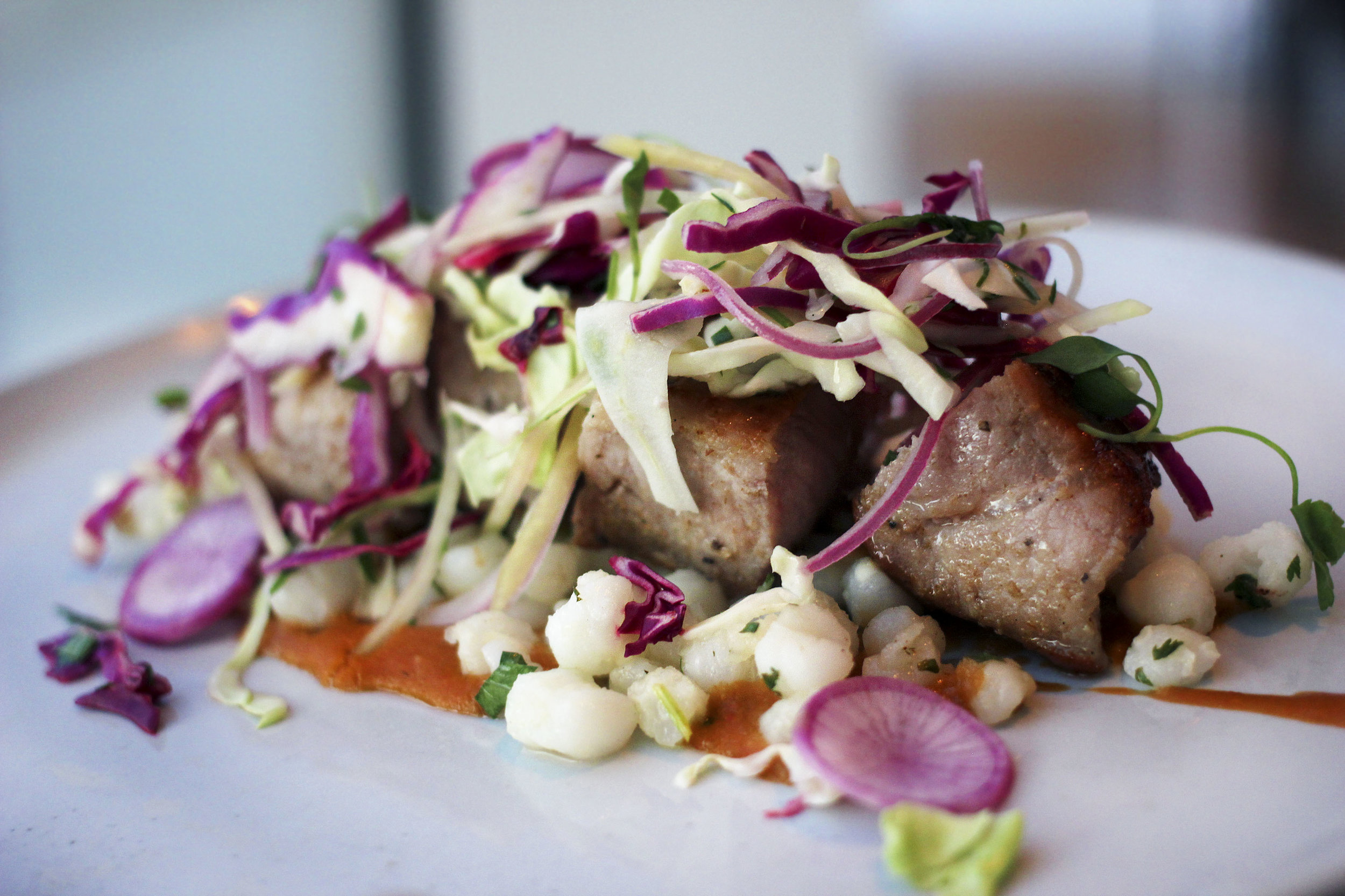Chefs take on Pozole. PORK LOIN - Hominy, ancho puree, papaya cabbage slaw, cilantro. One of my favorite dishes.