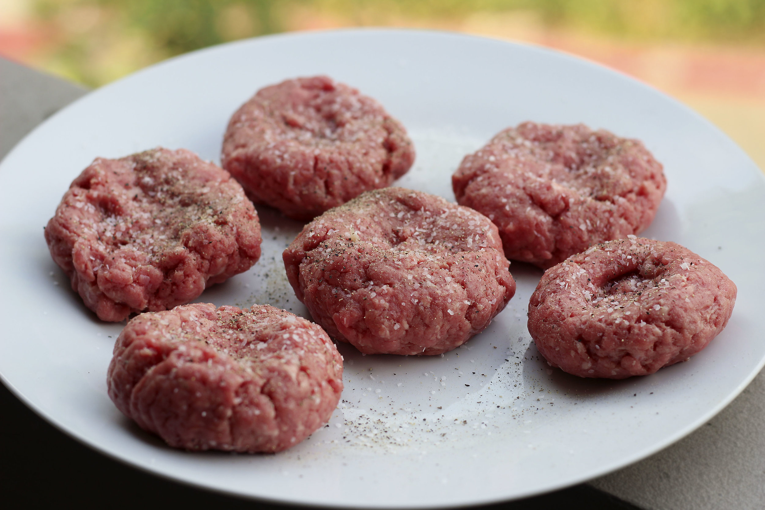 form mini sliders. season with salt and peppa.