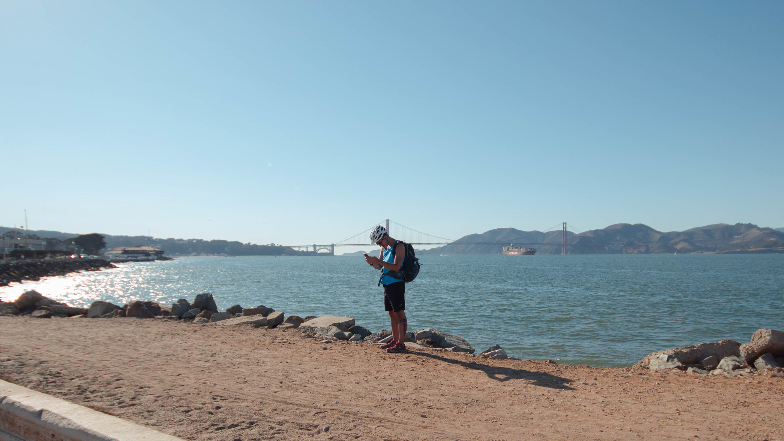 A shot of Juan Flores documenting our bike ride with REI through the Presidio of San Francisco . 
