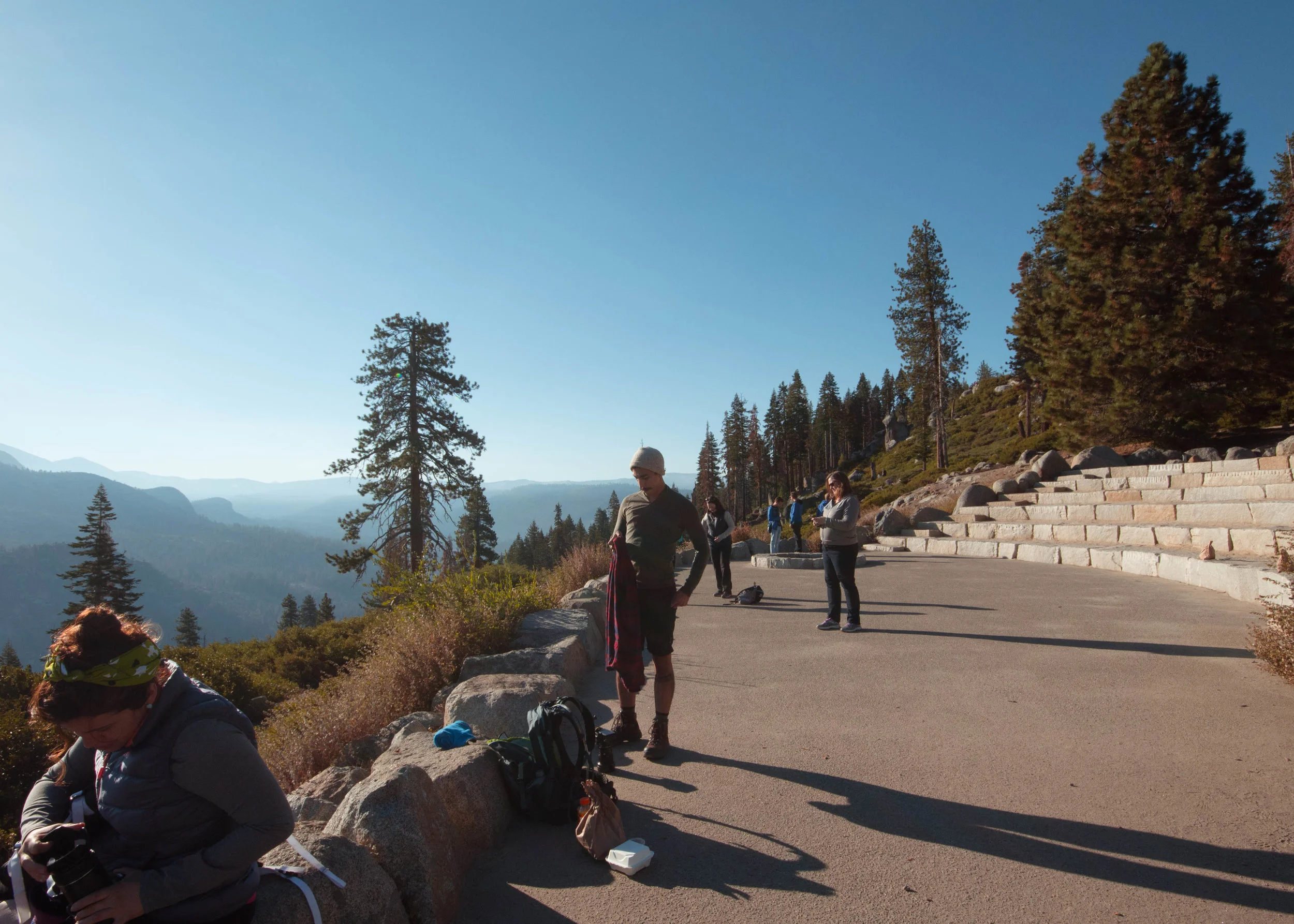 Victoria Gonzalez, Juan Flores, and Rocio Lower (in the background), taking in the first moment at Glacier Point.