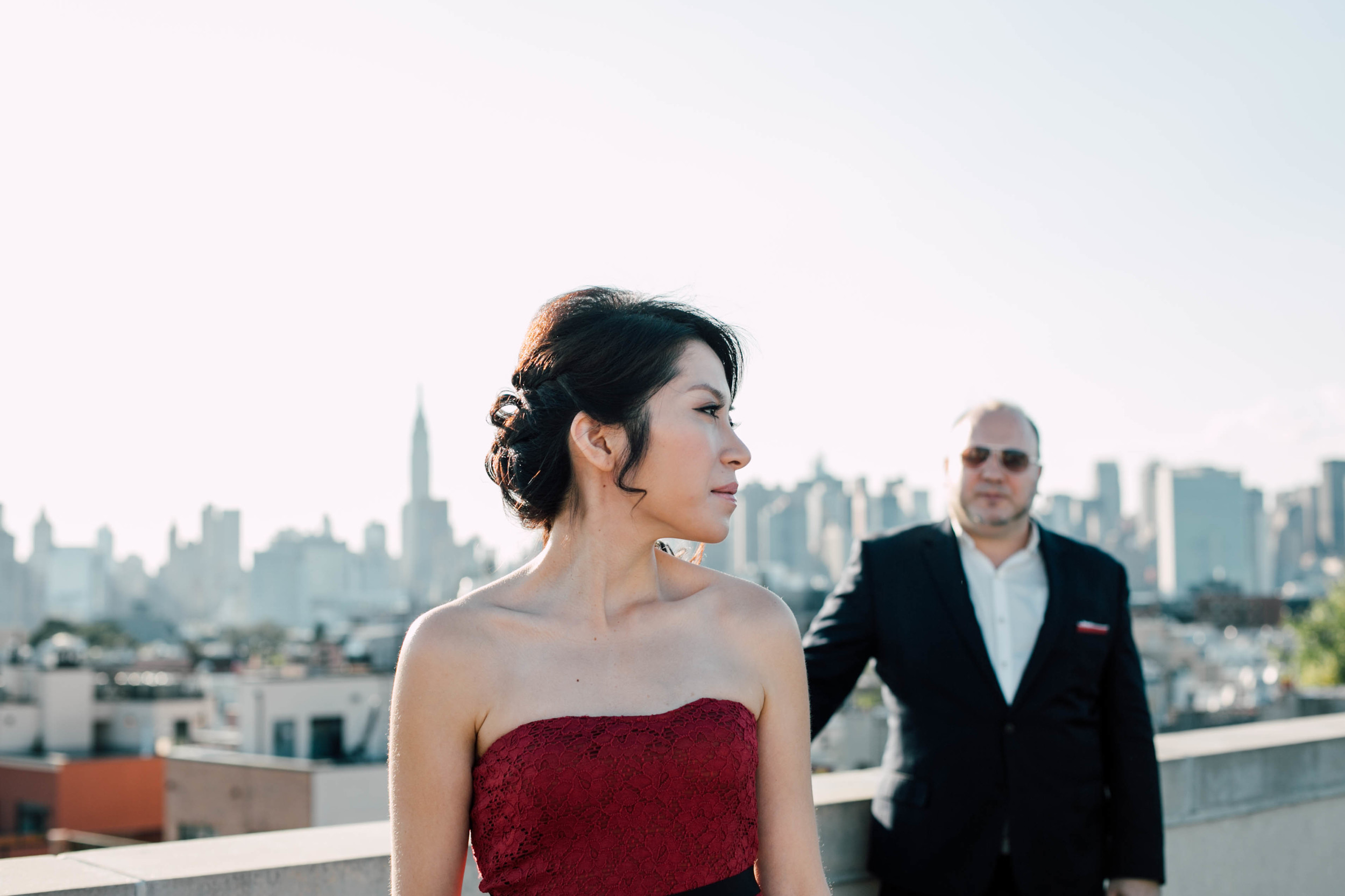 outdoor engagement session with a skyline view