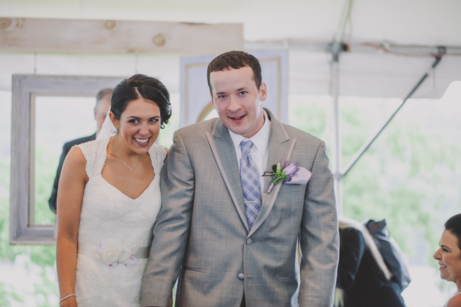 bride and groom walking down isle in connecticut