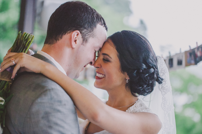 bride and groom excited after exchanging vows