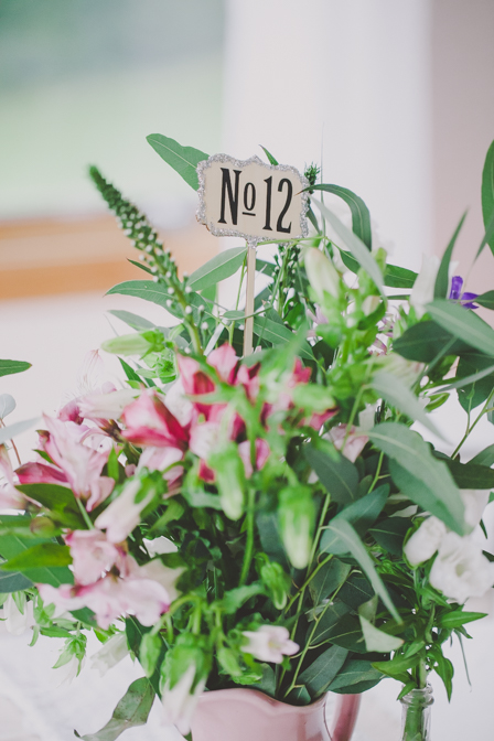 table centerpiece made up of flowers at wedding 
