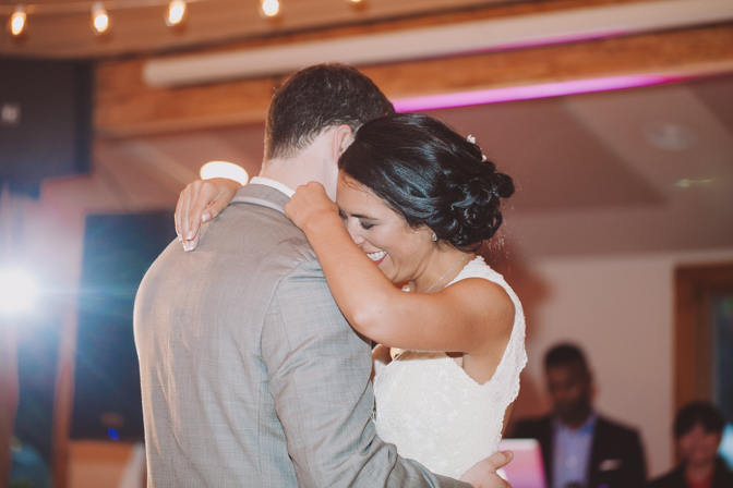 bride and groom have their first dance together