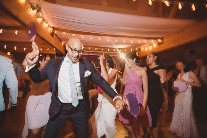 dancing photos of fun wedding in lake house 