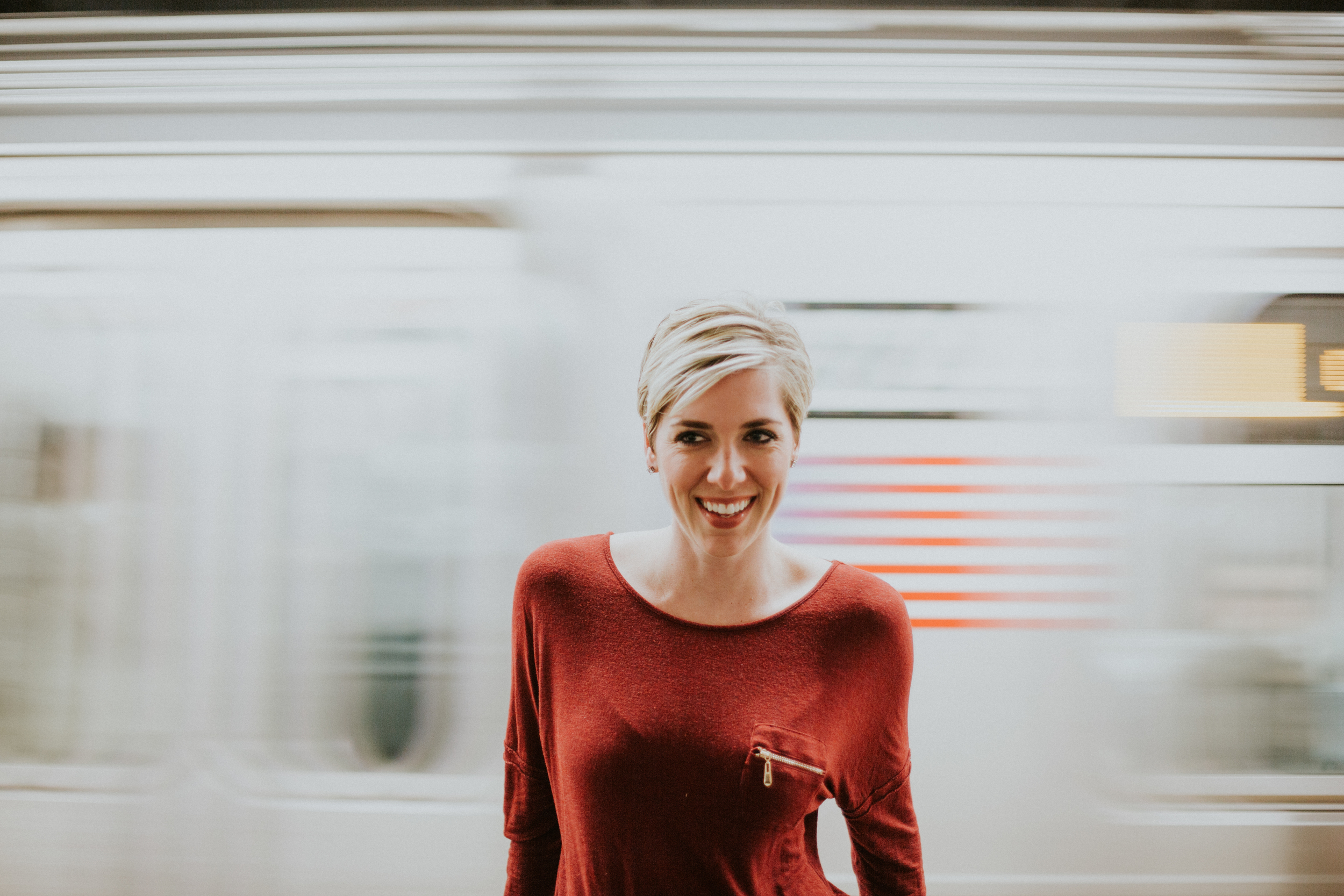 long exposure girl in front of train photography