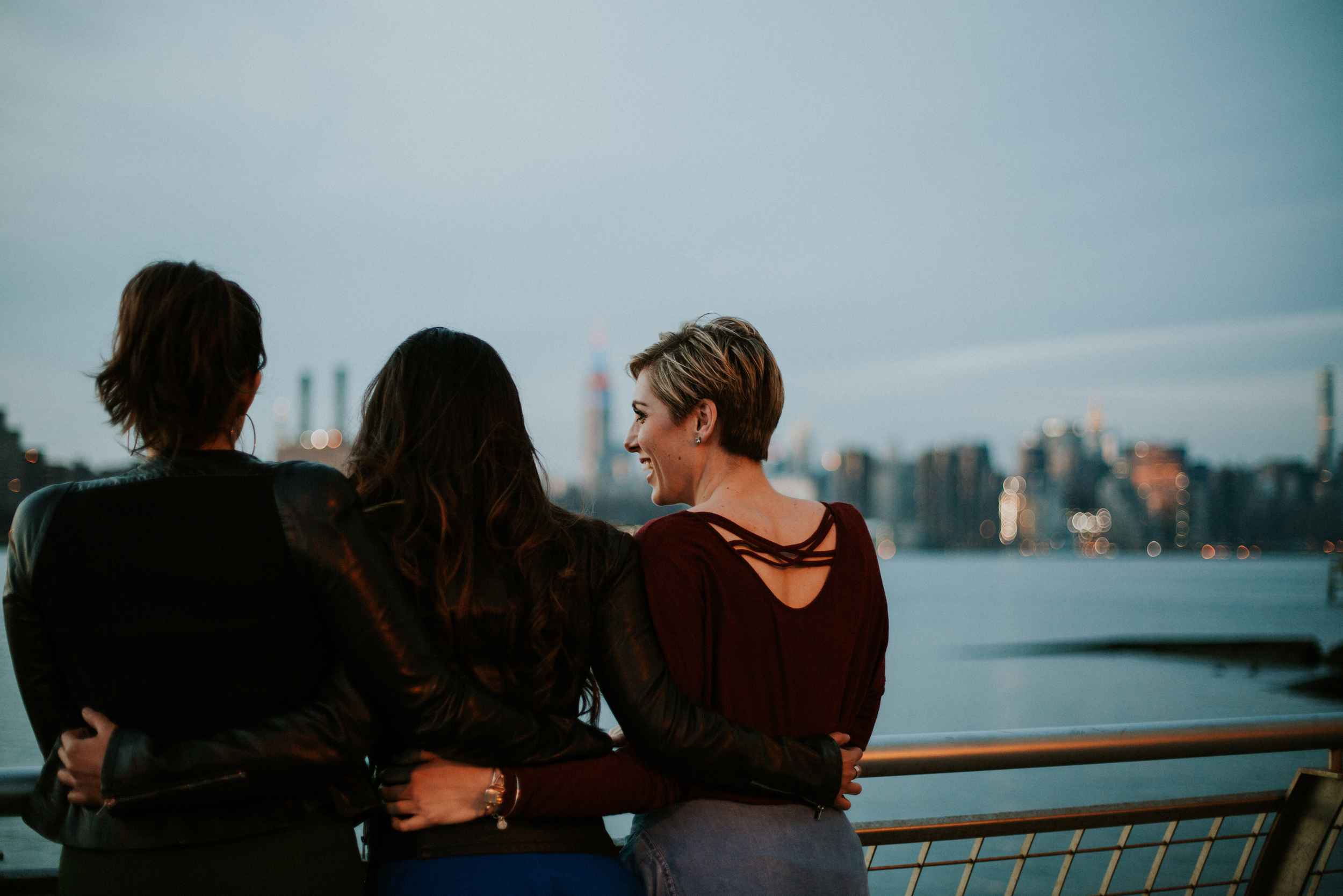 friends in front of nyc skyline