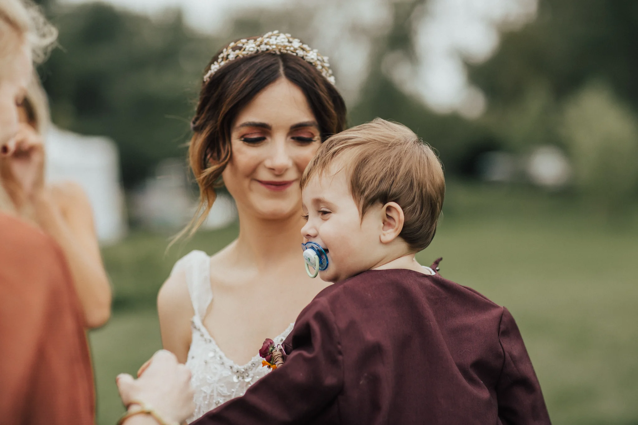 mom and child on wedding day