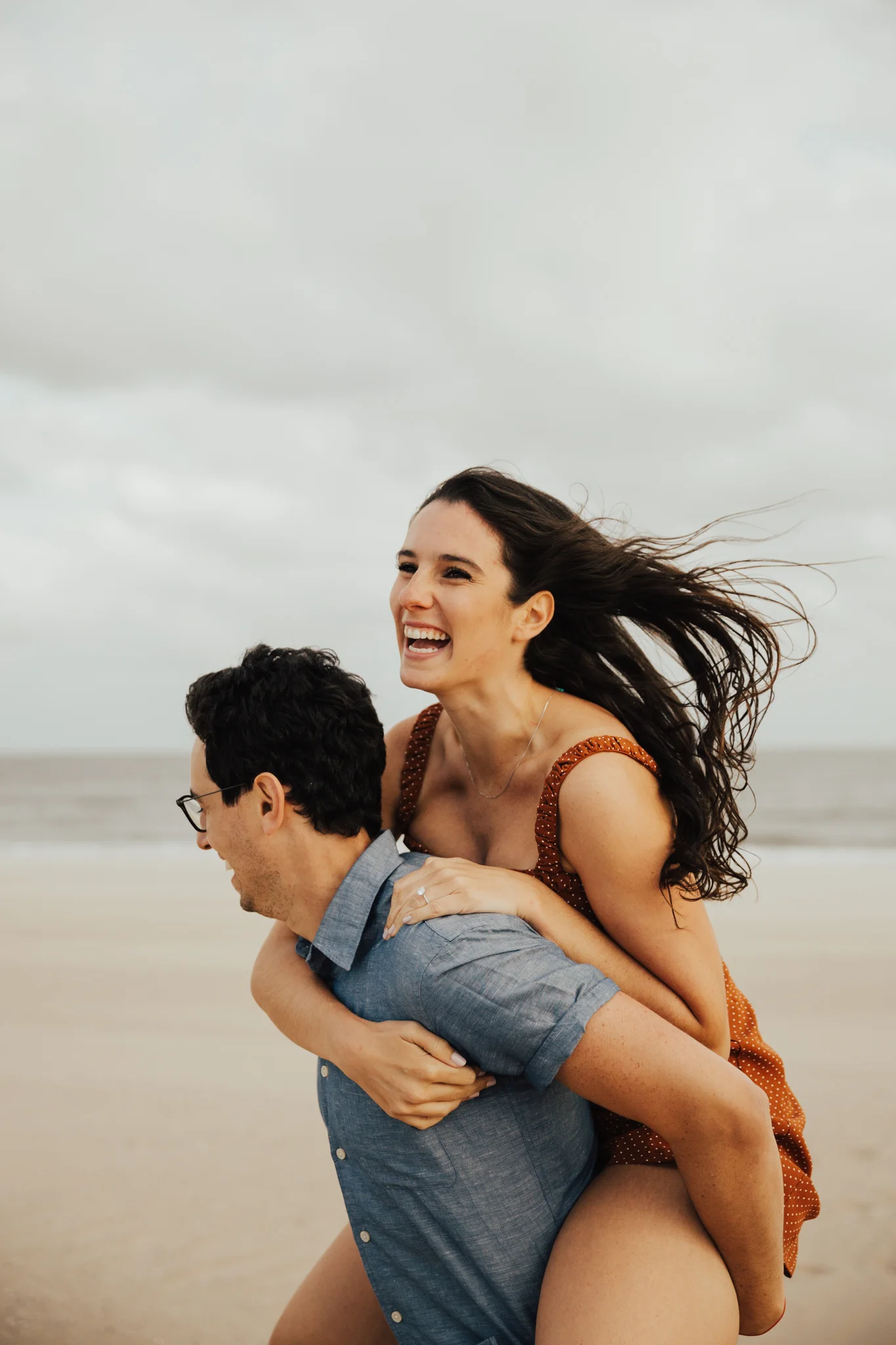 fun beach engagement