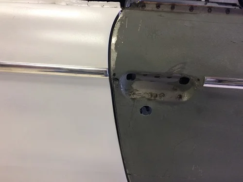Drilled holes for door trim