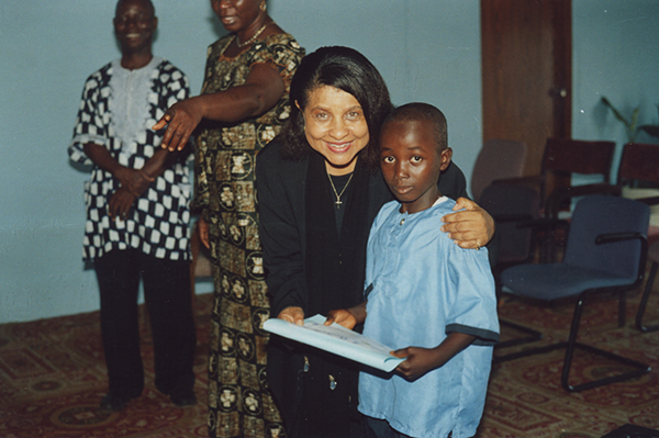 Pastor Rosetta Cox with student