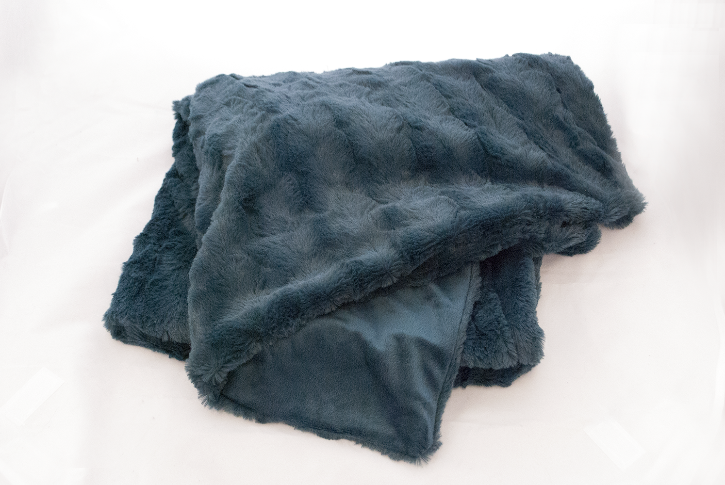 teal plush throw Quantity: 1 Price: $5.50