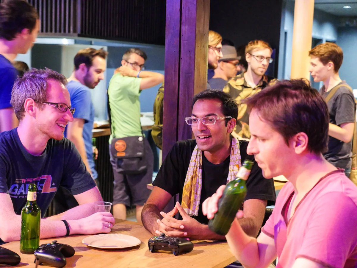 Developers from at least ten different countries all drinking and playing games together. Some are freelancers, other work for local indie developers like Q-Games, Vitei, and 17bit. Occasionally we even get some ex-Nintendo employees!