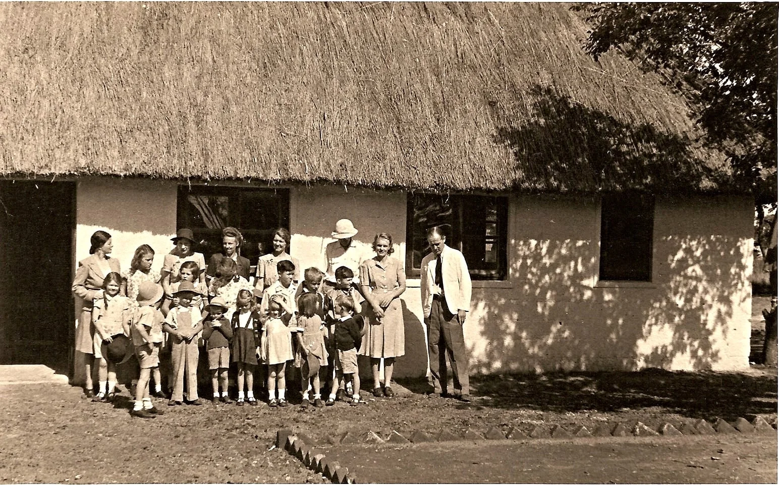 Abercorn (European) Primary School 1948/49. Mrs Pat Williams top left with her daughter Yvonne in front. Mrs Bredo the wife of the director of the IRLCS is further along the back row. Mrs Mantell headmistress is centre back with Bill Williams in front of her. The Bredo children are in front in dungarees.
