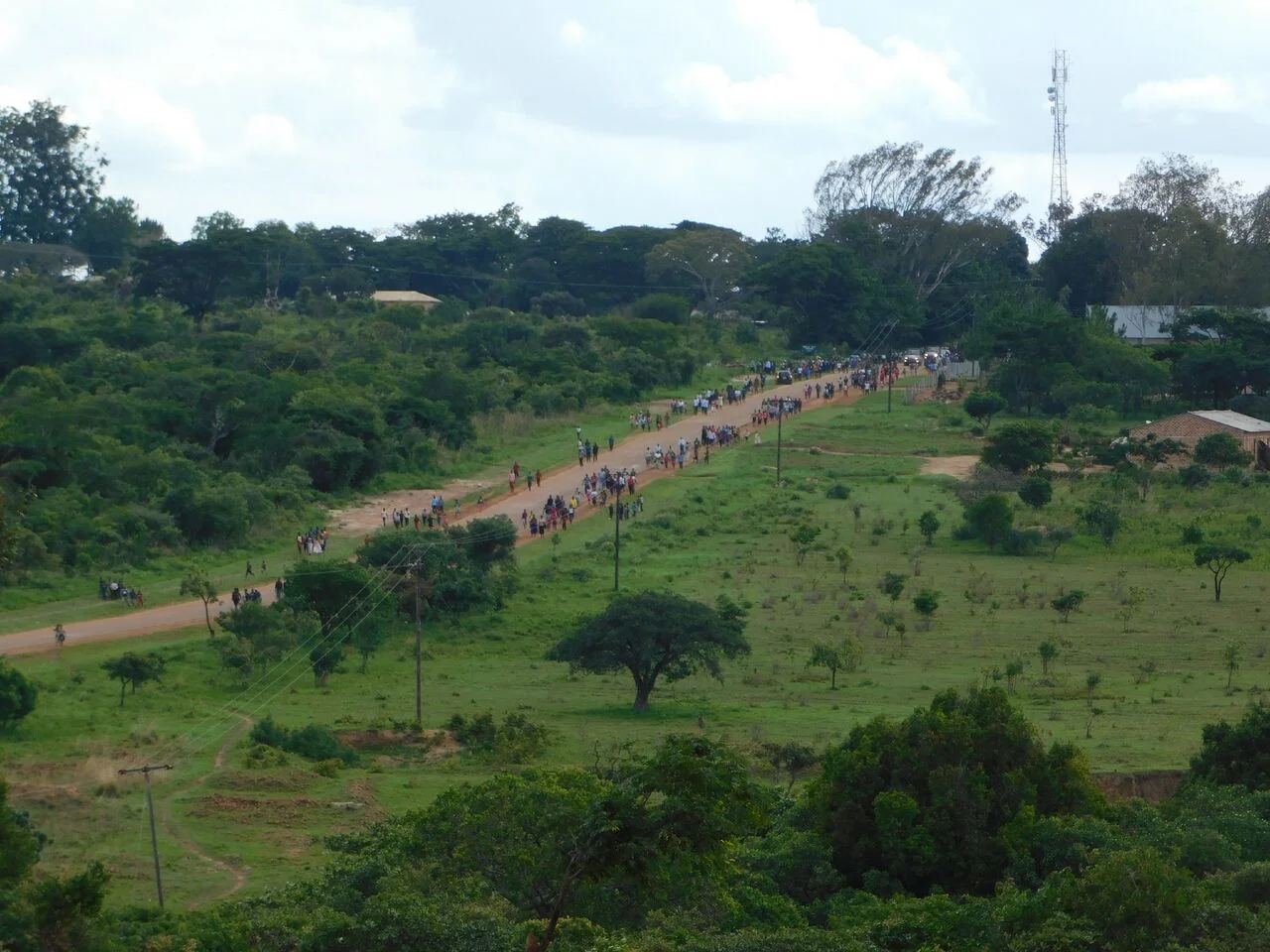 Crowds moving down to Lake Chila after the ceremony at the Memorial.