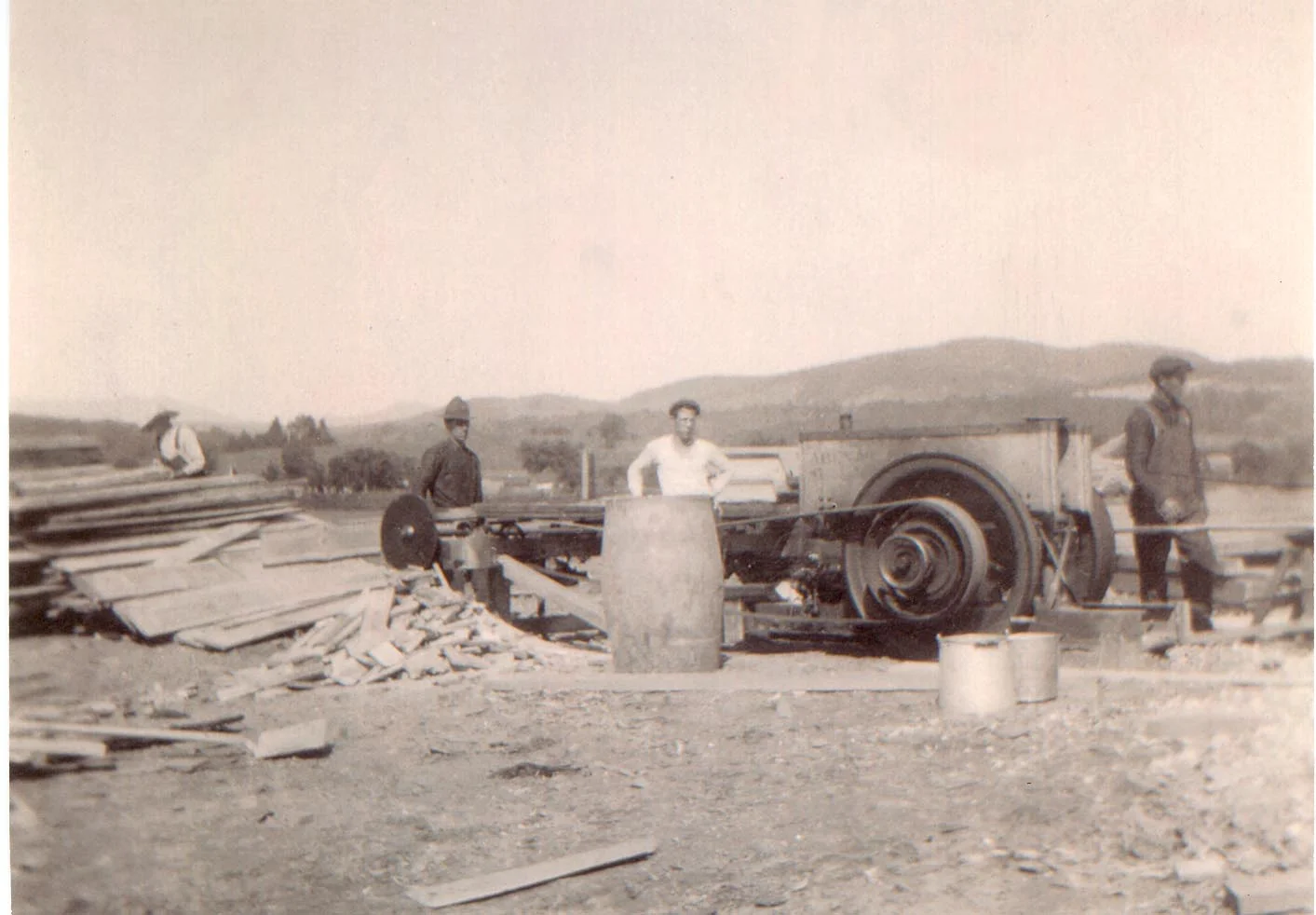The barn reconstruction team, milling boards.