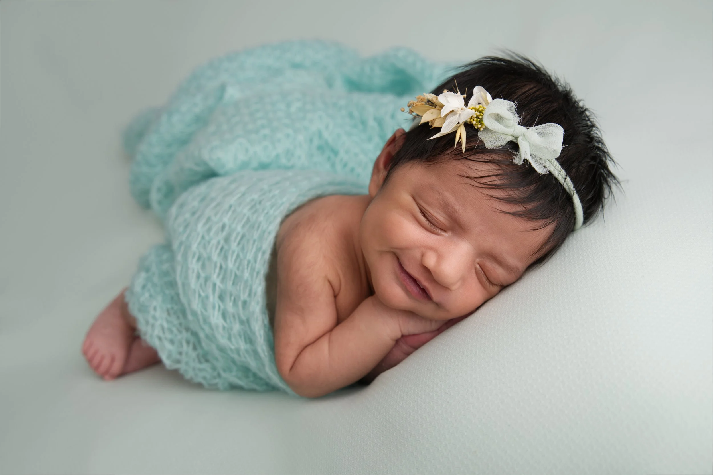 Baby girl with mint wrap