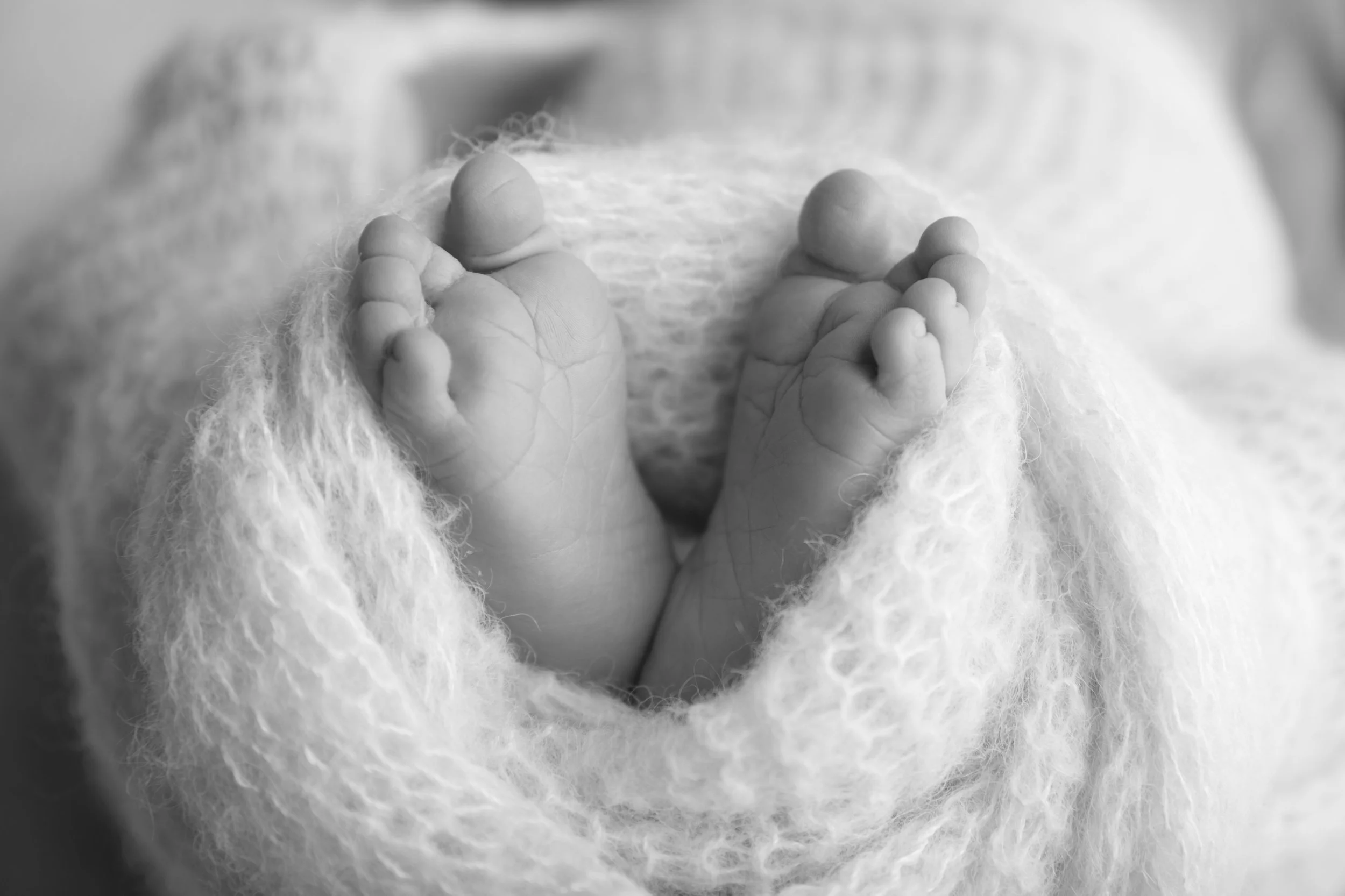 Baby feet in black and white
