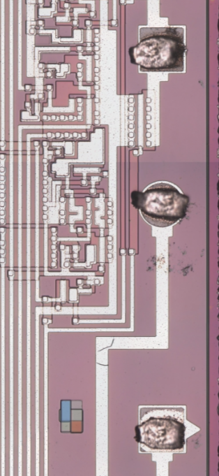 Three bond pads on the right side of the die.