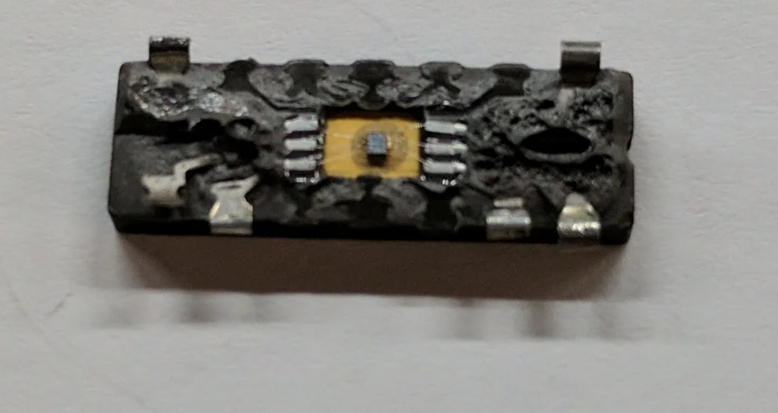 Note that I cut off the pins afterwards so I could photograph the die more easily.