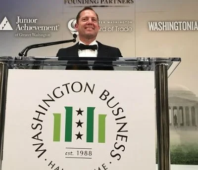 PenFed Credit Union President and CEO James Schenck speaks to 1,300 supporters at the Washington Business Hall of Fame Gala which raised $1.3 million for Junior Achievement