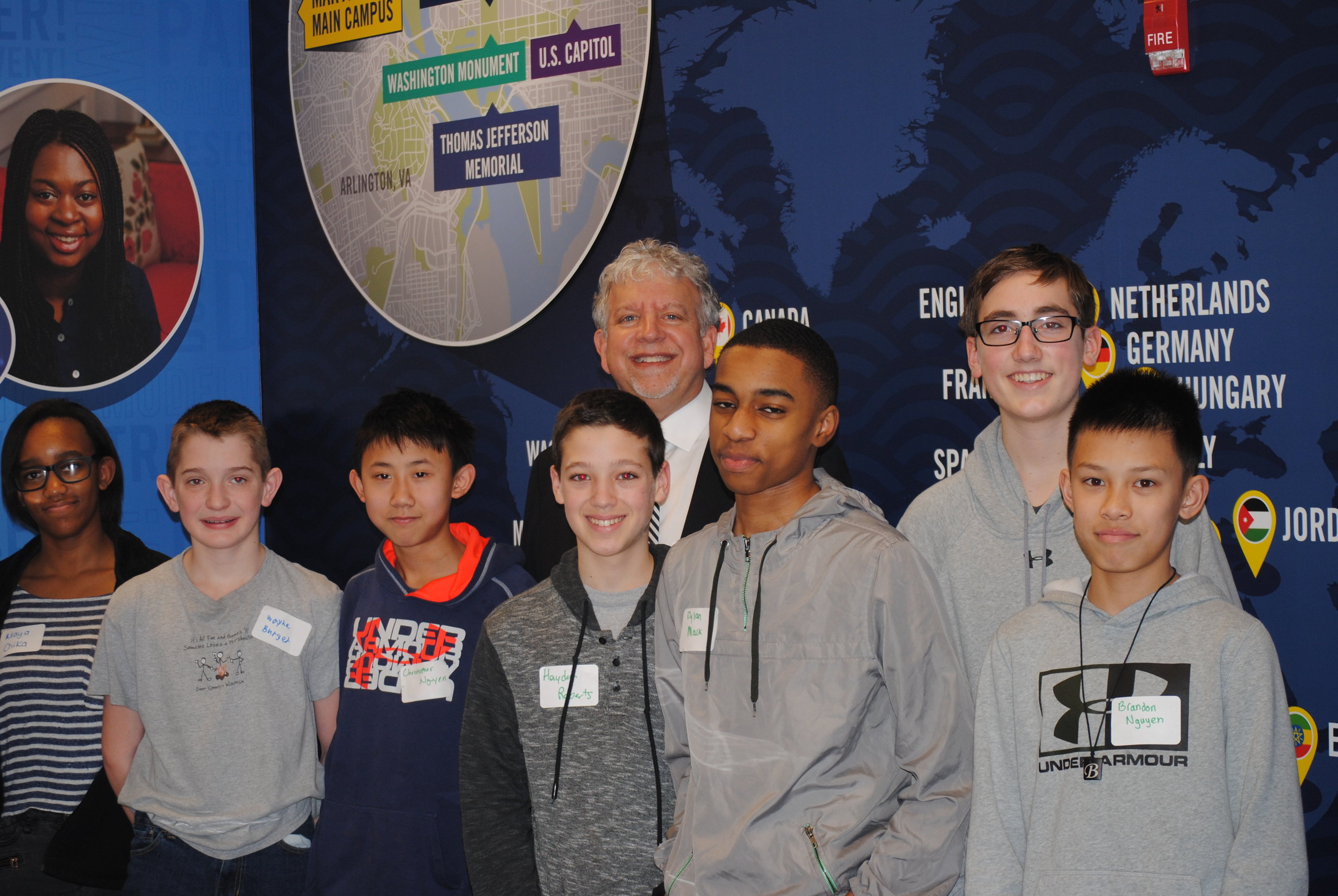 Marymount University President, Dr. Matt Shank, at JA Finance Park Fairfax County with Frost Middle School students. 