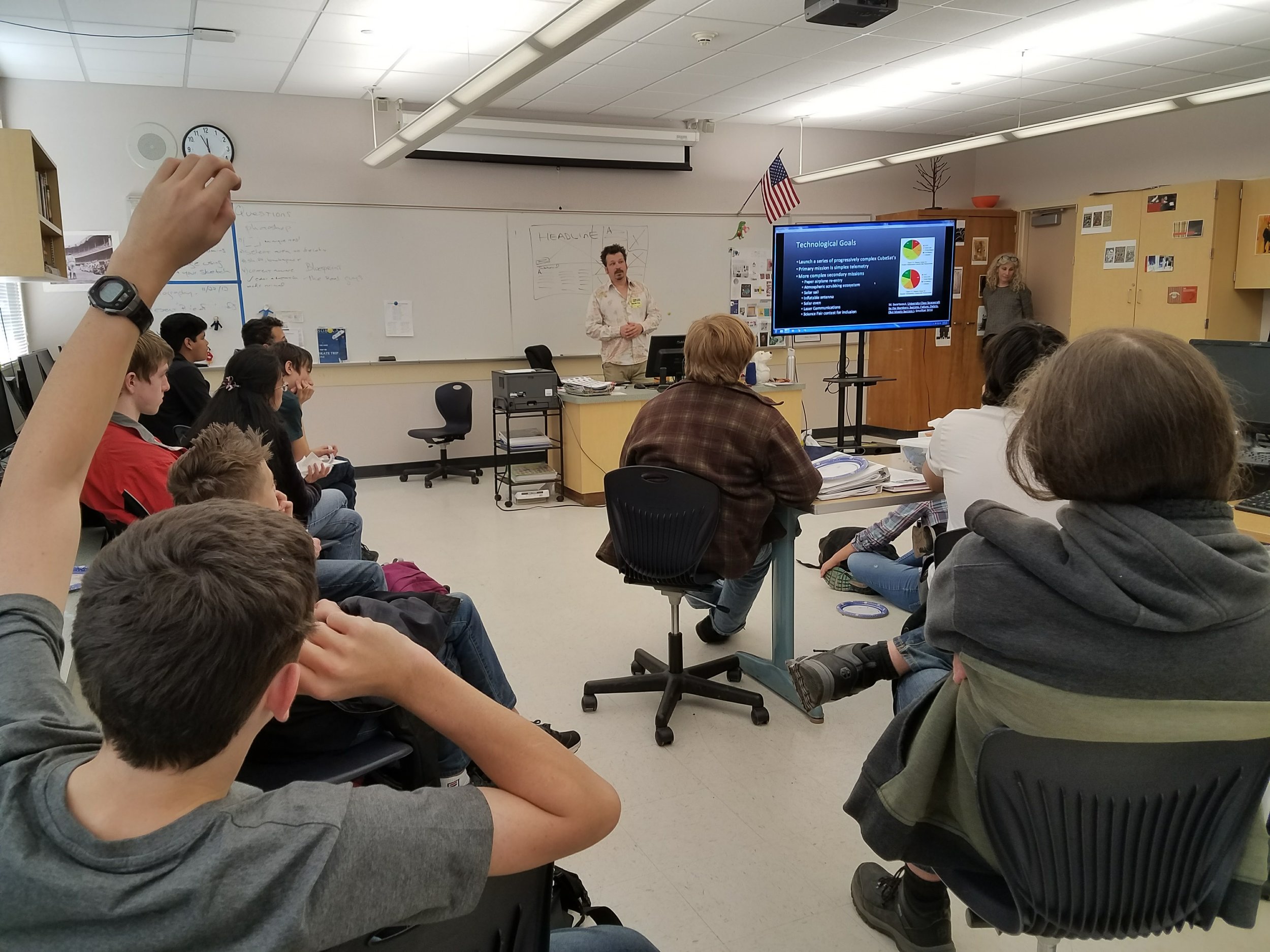 Evan J. Neumann answers a room full of questions about Cube Satellites.