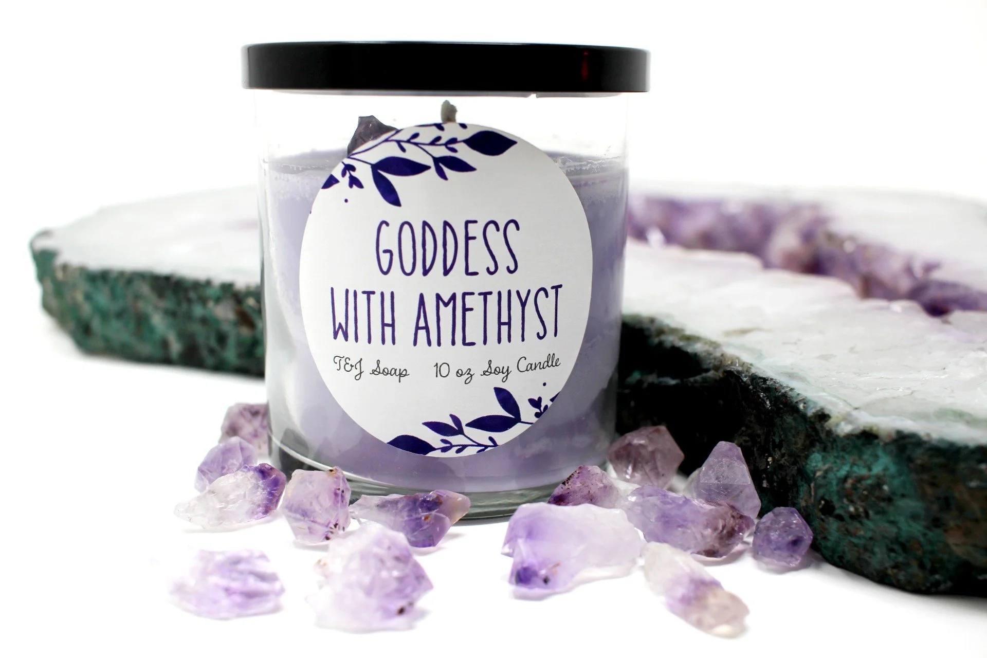 Light Purple Soy Candle in Glass Container. The Soy Candle is called Goddess with Amethyst and comes with an amethyst point.