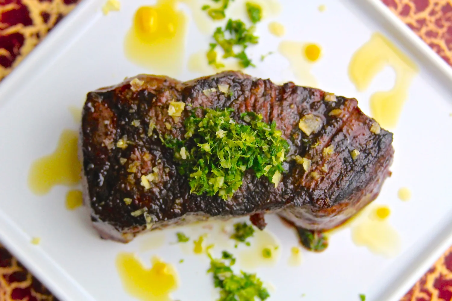 Grilled Strip Steak with Gremolata and Chipotle Olive Oil