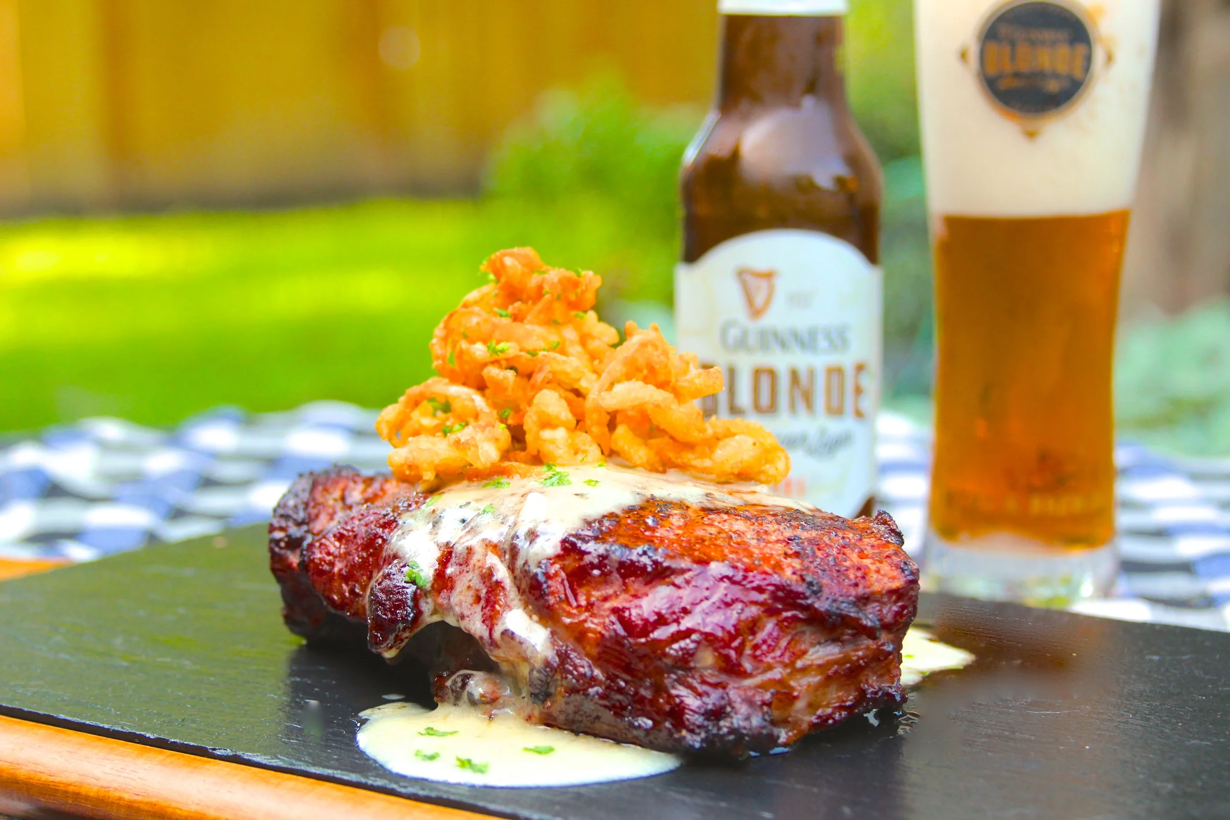 Grilled Ribeye with Meyer Lemon Beer Blanc and Fried Onion Strings