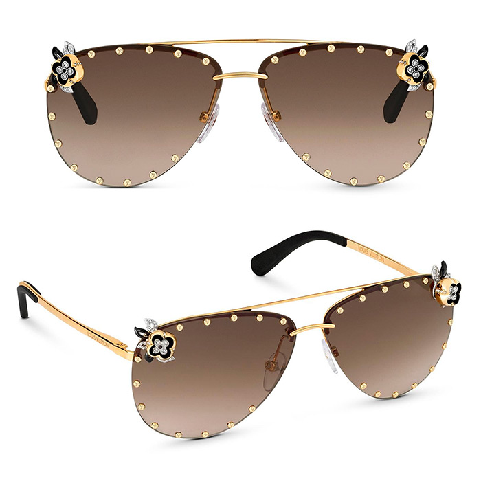 The Party Fleur Sunglasses $1,100.00 inspired by the House's 'Miss Windsor' jewelry collection, strass flowers and studs