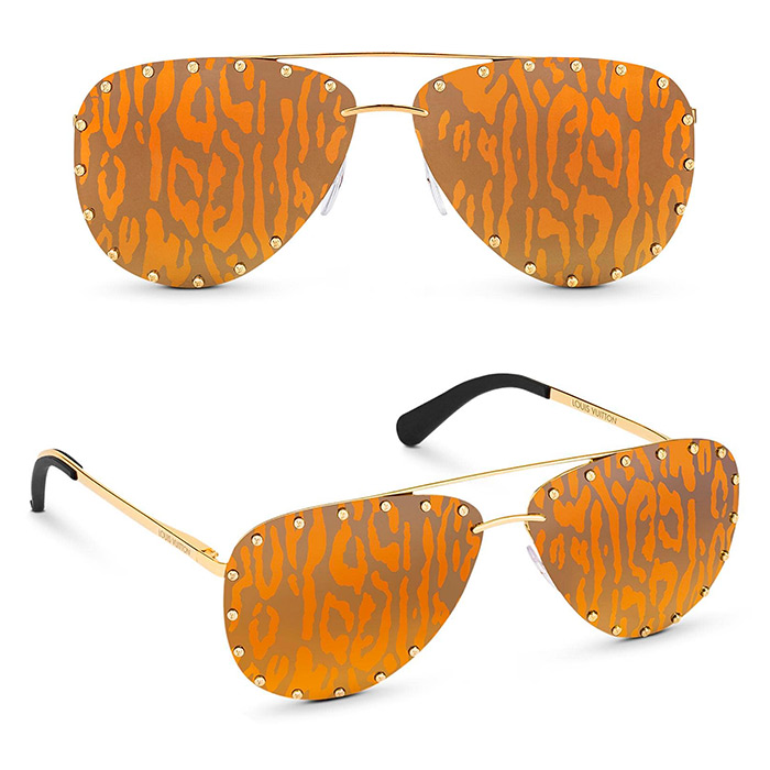The Party Sunglasses $705.00 Gold-color metal frames, leopard-print lenses for an eye-catching look