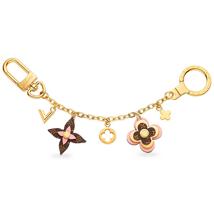 Blooming Flowers Chain Bag Charm and Key Holder $515.00 Pink Leather, dual-function clasp  effortlessly attach onto a bag or keys