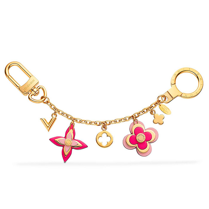 Blooming Flowers Chain Bag Charm and Key Holder $515.00 embellished with tiny studs, small gold Vs and flower charms